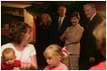 Mrs. Laura Bush waves to visitors during a tour of Cinergy Children's Museum in Cincinnati, Ohio, Wednesday, October 11, 2006. Ranked among the world's top 25 children museums, Cinergy Children's Museum offers more than 1,800 hours of programming for children in areas such as arts, culture, reading and science.