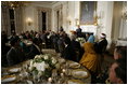 President George W. Bush addresses the Iftaar Dinner with Ambassadors and Muslim leaders in the State Dining Room of the White House, Monday, Oct. 16, 2006.