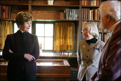 Mrs. Laura Bush listens to Sandy Bates, Secretary of the Board for Pearl S. Buck International, center, and Janice Walsh, daughter of Pearl S. Buck, right, Tuesday, October 24, 2006, during a tour of the Pearl S. Buck House National Landmark, a 2005 Save America's Treasures grant recipient, in Perkasie, Pennsylvania. Pearl S. Buck was the first woman to win the Nobel and Pulitzer Prizes and also dedicated her life to promoting tolerance, human rights and inter-cultural understanding.