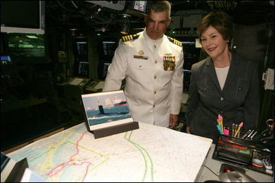 Mrs. Laura Bush and Captain John Litherland, Commanding Officer of the USS Texas submarine, pause in the control room of the submarine during a tour of the ship Saturday, September 9, 2006, in Galveston, Texas. Mrs. Bush later participated in the Commissioning Ceremony marking the entry of the vessel into the U.S. Atlantic Fleet.