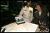 Mrs. Laura Bush and Captain John Litherland, Commanding Officer of the USS Texas submarine, pause in the control room of the submarine during a tour of the ship Saturday, September 9, 2006, in Galveston, Texas. Mrs. Bush later participated in the Commissioning Ceremony marking the entry of the vessel into the U.S. Atlantic Fleet.