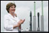 Mrs. Laura Bush, ship sponsor of the USS Texas, applauds at the conclusion of the Commissioning Ceremony Saturday, September 9, 2006, in Galveston, Texas.