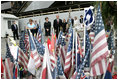 During their visit to Ground Zero, President George W. Bush and Laura Bush look at a memorial created from some of the objects visitors have brought to the site in New York City Sunday, September 10, 2006.