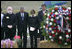 President George W. Bush and Laura Bush stand in silence after placing a wreath to commemorate the fifth anniversary of the September 11th attacks Monday, Sept. 11, 2006, in Shanksvillle, Pa., where United flight 93 crashed after the passengers fought against the terrorist hijackers.