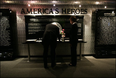 President George W. Bush and Laura Bush sign a guest book at the Pentagon in Arlington, Va., Monday, September 11, 2006, before participating in a ceremony marking the fifth anniversary of the September 11th attacks.