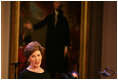 Mrs. Laura Bush welcomes guests to the East Room for entertainment Thursday night, Sept. 14, 2006, during the Thelonious Monk Institute of Jazz dinner at the White House.