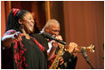 Jazz vocalist Lisa Henry and saxophonist Bobby Watson perform their version of "Kansas City" during the Thelonious Monk Institute of Jazz dinner Thursday night, Sept. 14, 2006, in the East Room of the White House.