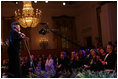 President George W. Bush and Mrs. Laura Bush listen as vocalist Anita Baker sings "My Funny Valentine" Thursday, Sept. 14, 2006, during an evening of festivities surrounding the Thelonious Monk Institute of Jazz dinner at the White House.