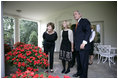 President George W. Bush and Mrs. Laura Bush are joined outside the Oval Office by the 2006 National Spelling Bee Champion, Kerry Close, as they call for Barney and Miss Beazley Friday, Sept. 22, 2006. The 9th grader from Spring Lake, N.J., won the competition by correctly spelling the word "Ursprache."