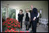 President George W. Bush and Mrs. Laura Bush are joined outside the Oval Office by the 2006 National Spelling Bee Champion, Kerry Close, as they call for Barney and Miss Beazley Friday, Sept. 22, 2006. The 9th grader from Spring Lake, N.J., won the competition by correctly spelling the word "Ursprache."