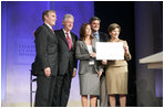 Mrs. Laura Bush announces a $60 million public-private partnership between the U.S. Government and the Case Foundation at President Bill Clinton's Annual Global Initiative Conference in New York Wednesday, September 20, 2006. With her, from left, are: Raymond Chambers, Chairman, MCJ and Amelier Foundations; former President Bill Clinton, and Jean Case and Steve Case, founders of the Case Foundation. The partnership will work to provide clean water by 2010 to up to 10 million people in sub-Sahara Africa, where a child dies every 15 seconds due to illnesses related to unsanitary drinking water.