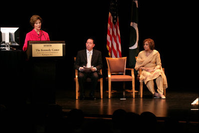 Mrs. Laura Bush, joined by President Michael Kaiser of the John F. Kennedy Center for the Performing Arts, and Mrs. Sehba Musharraf, wife of Pakistan's President Pervez Musharraf, delivers remarks during a presentation for the launching of a new Pakistani arts and cultural website Thursday, September 21, 2006, at The Kennedy Center in Washington, D.C. The website is created by the Pakistan National Council the Arts and The Kennedy Center and is called, "Gift of the Indus: The Arts and Culture of Pakistan."