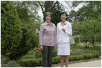 Mrs. Laura Bush and Mrs. Akie Abe, wife of Japanese Prime Minister Shinzo Abe, tour the gardens at the Mount Vernon Estate of George Washington Thursday, April 26, 2007, in Mount Vernon, Va.