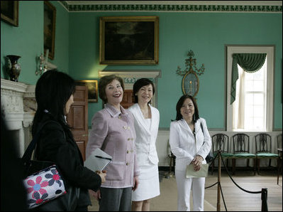 Mrs. Laura Bush and Mrs. Akie Abe, wife of Japanese Prime Minister Shinzo Abe, react to a humorous comment on their tour of the Mount Vernon Estate of George Washington Thursday, April 26, 2007, in Mount Vernon, Va.