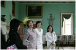 Mrs. Laura Bush and Mrs. Akie Abe, wife of Japanese Prime Minister Shinzo Abe, react to a humorous comment on their tour of the Mount Vernon Estate of George Washington Thursday, April 26, 2007, in Mount Vernon, Va.