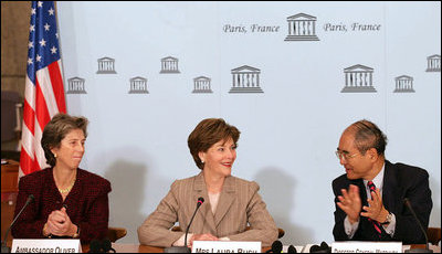 Mrs. Laura Bush, who serves as an Honorary Ambassador to the United Nations Decade of Literacy, addresses UNESCO participants during a roundtable discussion while visiting Paris Monday, Jan. 15, 2007. Following the White House Conference on Global Literacy held in September 2006, UNESCO is hosting upcoming regional literacy conferences in Qatar, Costa Rica, Azerbaijan and Asia.