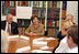 Mrs. Laura Bush and US Ambassador Craig Stapleton, left, participate in a roundtable discussion at the American Hospital of Paris Tuesday, Jan. 16, 2007, in Neuilly-on-Seine, France.