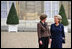 Mrs. Laura Bush visits with Madame Beradette Chirac outside the Elysee Palace during the International Centre for Missing and Exploited Children Meeting Wednesday, Jan. 17, 2007.