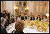 Mrs. Laura Bush attends a luncheon hosted by Madame Bernadette Chirac for the Conference on Missing and Exploited Children at the Elysee Palace in Paris Wednesday, Jan. 17, 2007. President Jacque Chirac of France is pictured in the center.