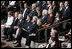 Mrs. Laura Bush, first row-center, joins former President Jimmy Carter and his wife, Rosalynn; former President Bill Clinton, and his wife, Hillary Clinton; Mrs. Nancy Reagan; Caroline Kennedy Schlossberg, her husband Edwin Schlossberg; Mrs. Barbara Bush; Susan Ford Bales, daughter of former President Gerald R. Ford; and Patricia "Tricia" Nixon Cox and her husband, Edward Cox, upper-right, at the funeral service for former first lady Lady Bird Johnson Saturday, July 14, 2007, at the Riverbend Centre in Austin, Texas. 