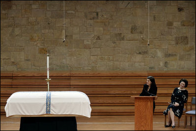 Luci Baines Johnson, left, and her sister, Lynda Bird Johnson Robb, offer remembrances of their mother, former first lady Lady Bird Johnson, during the funeral service Saturday, July 14, 2007, at the Riverbend Centre in Austin, Texas.