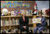 Mrs. Laura Bush, joined by U.S. Secretary of Education Margaret Spellings, reads to children at the Driggs School in Waterbury, Conn., Tuesday, July 24, 2007. Mrs. Bush also announced the 2007 Improving Literacy through School Libraries grants being awarded by the U.S. Department of Education. 