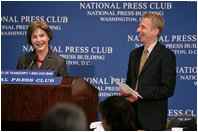 Mrs. Laura Bush participates in a question and answer session after addressing the National Press Club Wednesday, July 25, 2007 in Washington D.C. Mrs. Bush, joined by National Press Club President Jerry Zremski, talked about inspiring stories of what people are doing to help those with HIV/AIDS. "But certainly one of the most moving parts is the work that so many groups are doing on ground in Africa," said Mrs. Bush. "(Bruce Wilkinson, Director of the RAPIDS Consortium), have a donor who has given 23,000 bicycles to Zambia, so that the care-givers that we met can literally go door to door in their neighborhoods and find out who needs help."