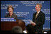 Mrs. Laura Bush participates in a question and answer session after addressing the National Press Club Wednesday, July 25, 2007 in Washington D.C. Mrs. Bush, joined by National Press Club President Jerry Zremski, talked about inspiring stories of what people are doing to help those with HIV/AIDS. "But certainly one of the most moving parts is the work that so many groups are doing on ground in Africa," said Mrs. Bush. "(Bruce Wilkinson, Director of the RAPIDS Consortium), have a donor who has given 23,000 bicycles to Zambia, so that the care-givers that we met can literally go door to door in their neighborhoods and find out who needs help."