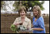 Mrs. Laura Bush and Ms. Jenna Bush pick vegetables during their visit to the Fann Hospital garden with Senegalese First Lady Viviane Wade and her daughter Tuesday, June 26, 2007, in Dakar, Senegal. Supported by USAID, the Fann Hospital gardens provide fresh vegetables to address the nutritional needs of patients with HIV/AIDS, an overlooked, but essential part of their care.