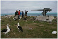 Mrs. Laura Bush views albatross birds and remnants of World War II with wildlife biologist John Klavitter during a tour of Eastern Island on Midway Atoll, part of the Northwest Hawaiian Islands National Monument, Thursday, March 1, 2007. Midway Atoll was the site of the Battle of Midway June 4, 1942. The U.S. Navy defeated a Japanese attack against Midway Islands, marking a turning point in the war in the pacific theater.