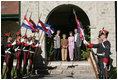 President George W. Bush and Mrs. Laura Bush meet President Tabare Vazquez of Uruguay and his wife, Maria Auxiliadora Delgado de Vazquez at the Main House, Estancia Anchorena, in Colonia, Uruguay, Saturday, March 10, 2007.