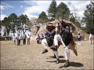 In March, Mrs. Laura Bush traveled with President George W. Bush to Brazil, Uruguay, Colombia, Guatemala and Mexico. During her trip Mrs. Bush highlighted literacy and education programs as well as visiting important cultural sites. In this photograph, members of the Patzun Dance group performs the dance, "La Danza de los Venados," Monday, March 12, 2007, during a visit to Iximche, Guatemala, by President George W. Bush and Mrs. Laura Bush and President Oscar Berger of Guatemala and his wife, Mrs. Wendy Widmann de Berger.