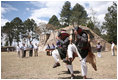 In March, Mrs. Laura Bush traveled with President George W. Bush to Brazil, Uruguay, Colombia, Guatemala and Mexico. During her trip Mrs. Bush highlighted literacy and education programs as well as visiting important cultural sites. In this photograph, members of the Patzun Dance group performs the dance, "La Danza de los Venados," Monday, March 12, 2007, during a visit to Iximche, Guatemala, by President George W. Bush and Mrs. Laura Bush and President Oscar Berger of Guatemala and his wife, Mrs. Wendy Widmann de Berger.