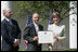 Mrs. Laura Bush presents a plaque to Craig Heller, center, president of Loftworks and John Steffen, left, president of Pyramid Construction, honoring them with a 2007 Preserve America Presidential Award in the Rose Garden at the White House Wednesday, May 9, 2007. The Steffen and Heller companies were honored for their work in preserving and revitalizing the historic downtown of St. Louis, Mo.