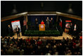 Mrs. Laura Bush delivers remarks during the announcement of the Jenna Welch Women's Center at Texas Tech - Permian Basin Campus Wednesday, Nov. 7, 2007, in Midland, Texas. Mrs. Bush is joined on stage by Speaker Tom Craddick of the Texas House of Representatives, left, Dr. John Jennings, center, and Texas Tech University Chancellor Kent Hance.