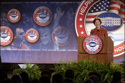 Mrs. Laura Bush speaks during a conference on Helping America's Youth Thursday, Nov. 8, 2007, at Dallas Baptist University in Dallas. "To make sure every child is surrounded by these positive influences, even more adults must dedicate themselves to helping young people," said Mrs. Bush. "Adults should be aware of the challenges facing children, and then they should take an active interest in children's lives. Adults, and especially parents, should build relationships where they teach their children healthy behaviors by their own good example."