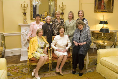 Mrs. Laura Bush is joined by former White House social secretaries Tuesday, Oct. 9, 2007 at the White House, during a tea in honor of Ms. Letitia Baldrige, front-row right, social secretary during the Kennedy administration. Joining Mrs. Bush, from left, are: Mrs. Elizabeth Clements Abell, seated left, social secretary during the Johnson administration; Ms.Maria Downs, social secretary under the Ford administration; Mrs. Lucy Winchester Breathitt, social secretary under the Nixon administration; Mrs. Ann Stock, social secretary during the Clinton administration; Amy Zantzinger, current White House social secretary and Mrs. Cathy Fenton, Mrs. Bush's former social secretary. 