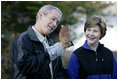 President George W. Bush and Mrs. Laura Bush have a close look at a screech owl Saturday, Oct. 20, 2007 at the Patuxent Research Refuge in Laurel, Md., where President Bush discussed steps his Administration is creating for a series of cooperative conservation steps to preserve and restore critical stopover habitat for migratory birds in the United States.