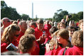 Mrs. Laura Bush hugs a woman during an event for military support organizations Tuesday, Sept. 18, 2007, on the South Lawn.