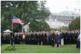 President George W. Bush and Mrs. Laura Bush are joined by Vice President Dick Cheney and Mrs. Lynne Cheney Tuesday, Sept. 11, 2007, on the South Lawn of the White House for a moment of silence in memory of those who died Sept. 11, 2001.