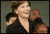 Mrs. Laura Bush stands with students from New York Public School 76 during the President's statement regarding No Child Left Behind Wednesday, Sept. 26, 2007, in New York City.