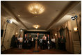 President George W. Bush discusses the reauthorization of No Child Left Behind Wednesday, Sept. 26, 2007, in New York. Those standing with President Bush include New York Mayor Michael Bloomberg, far left, Mrs. Laura Bush and students from New York Public School 76. "The No Child Left Behind Act is working. I say that because the Nation's Report Card says it's working," said President Bush. "Scores are improving, in some instances hitting all-time highs."