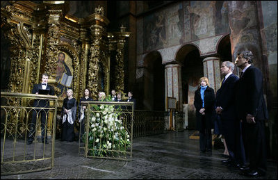 President George W. Bush and Mrs. Laura Bush joined by Ukrainian President Viktor Yushchenko and his wife, first lady Kateryna Yushchenko, listen to a musical performance by the Credo Chamber Choir Tuesday, April 1, 2008, during a tour of St. Sophia's Cathedral in Kyiv, Ukraine.