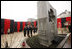 President George W. Bush and Mrs. Laura Bush, accompanied by President Victor Yushchenko and his wife Mrs. Kateryna Yushchenko, pay their respects at the Holodomor Memorial Tuesday, April 1, 2008, in Kyiv, Ukraine. The Holodomor Memorial is a remembrance to the victims 1932-1933 Ukrainian famine.