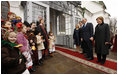 President George W. Bush and Mrs. Laura Bush joined by Ukrainian President Viktor Yushchenko and his wife, first lady Kateryna Yushchenko, are greeted by children, April 1, 2008, before touring St. Sophia's Cathedral in Kyiv, Ukraine.