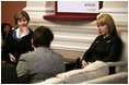 Mrs. Laura Bush and Mrs. Kateryna Yushchenko, wife of Ukrainian President Viktor Yushchenko, participate in a tea with breast cancer advocates and survivors Tuesday, April 1, 2008, at the Diplomatic Academy in Kyiv.