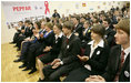 President George W. Bush and Mrs. Laura Bush applaud as they watch a skit sponsored by PEPFAR on HIV/AIDS performed by students at School 57 Tuesday, April 1, 2008, in Kyiv, Ukraine.