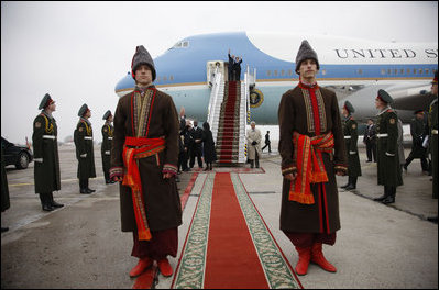 President George W. Bush and Mrs. Laura Bush wave as they prepare to depart Kyiv's Boryspil State International Airport Tuesday, April 1, 2008, after their daylong visit to Ukraine.