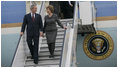 President George W. Bush and Mrs. Laura Bush steal a moment as they deplane Air Force One Wednesday, April 2, 2008, upon their return to Bucharest from the Romanian presidential retreat in Neptun, Romania.