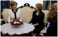 Mrs. Laura Bush and Croatia's First Lady Mrs. Milka Mesic sit for tea Friday, April 4, 2008, following the arrival of President and Mrs. Bush in Zagreb, where they will overnight before continuing on to Russia.